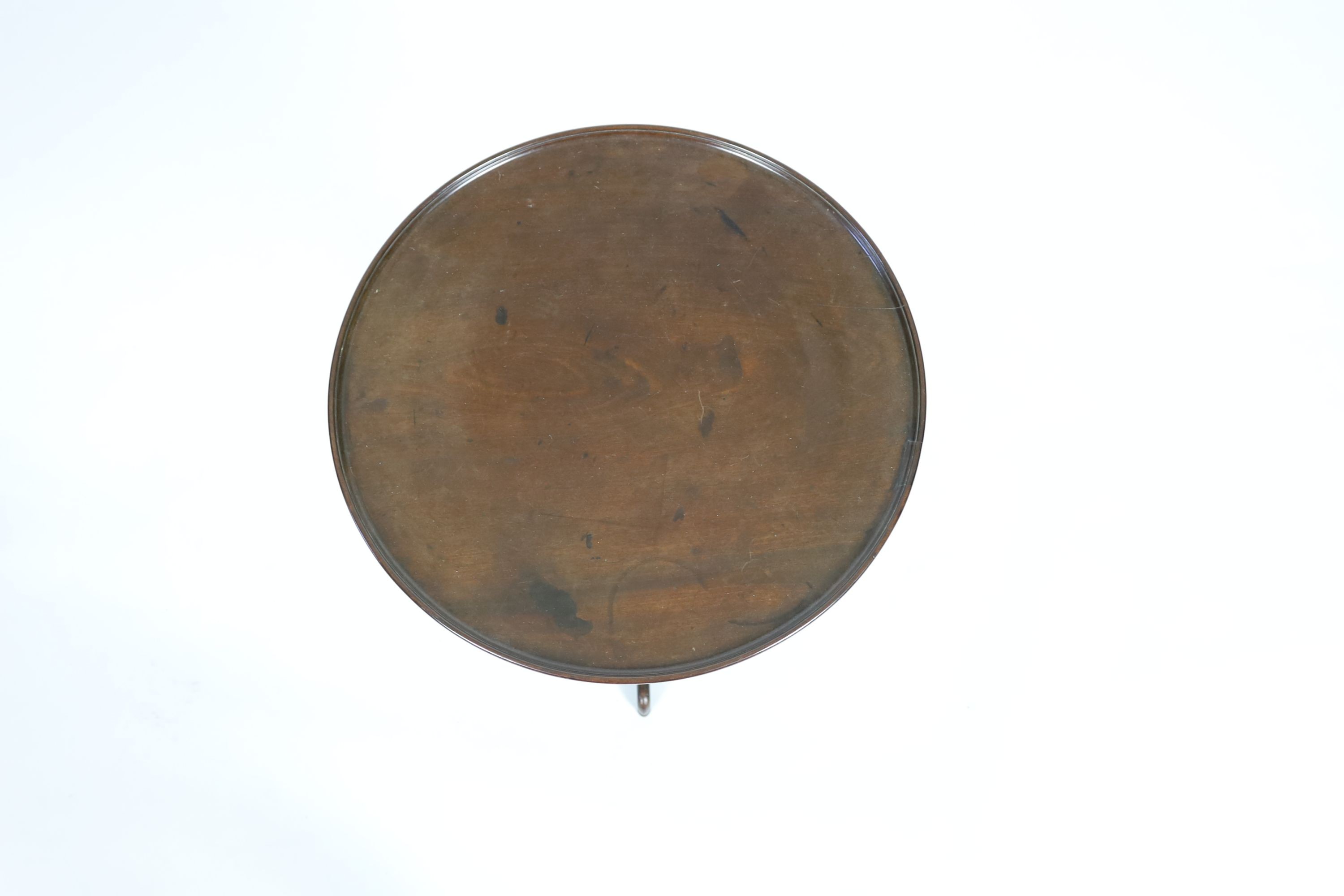 A George III circular mahogany tilt top tripod tea table, diameter 61cm height 70cm